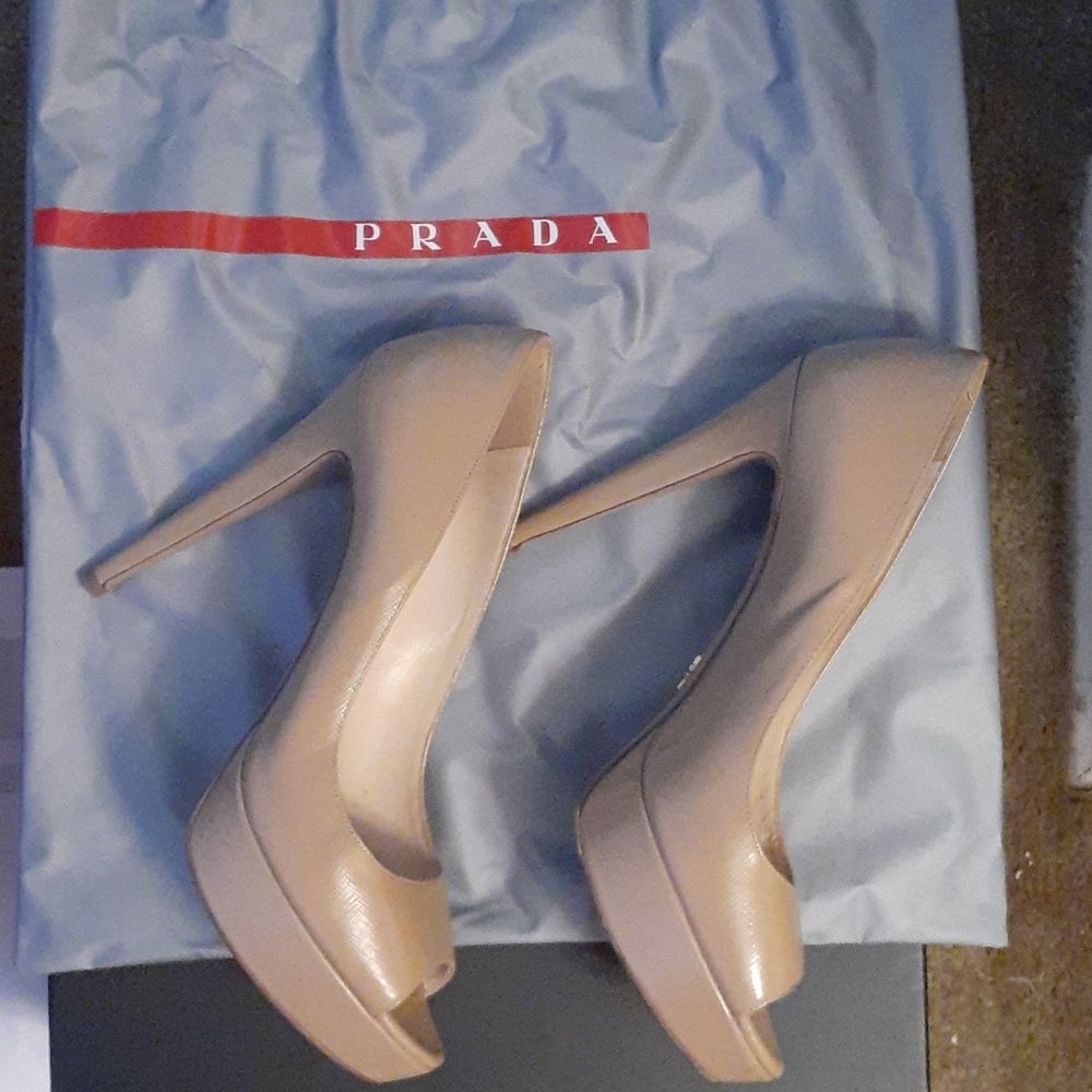 PRADA Nude platform stiletto heels.